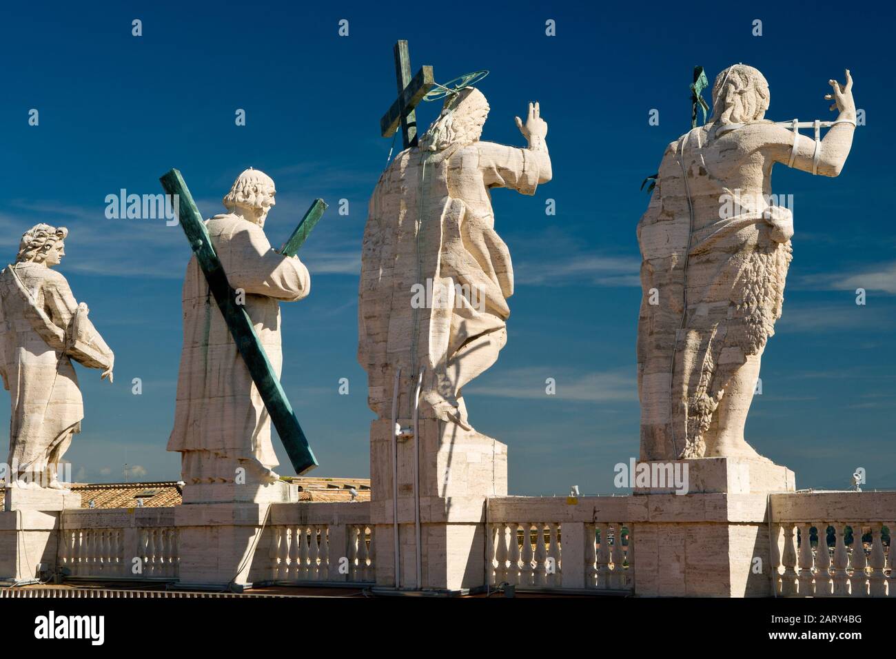 Statues of Christ and the apostles on the roof of St. Peter`s basilica, Vatican Stock Photo